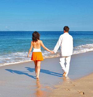 Couple on beach, Antigua